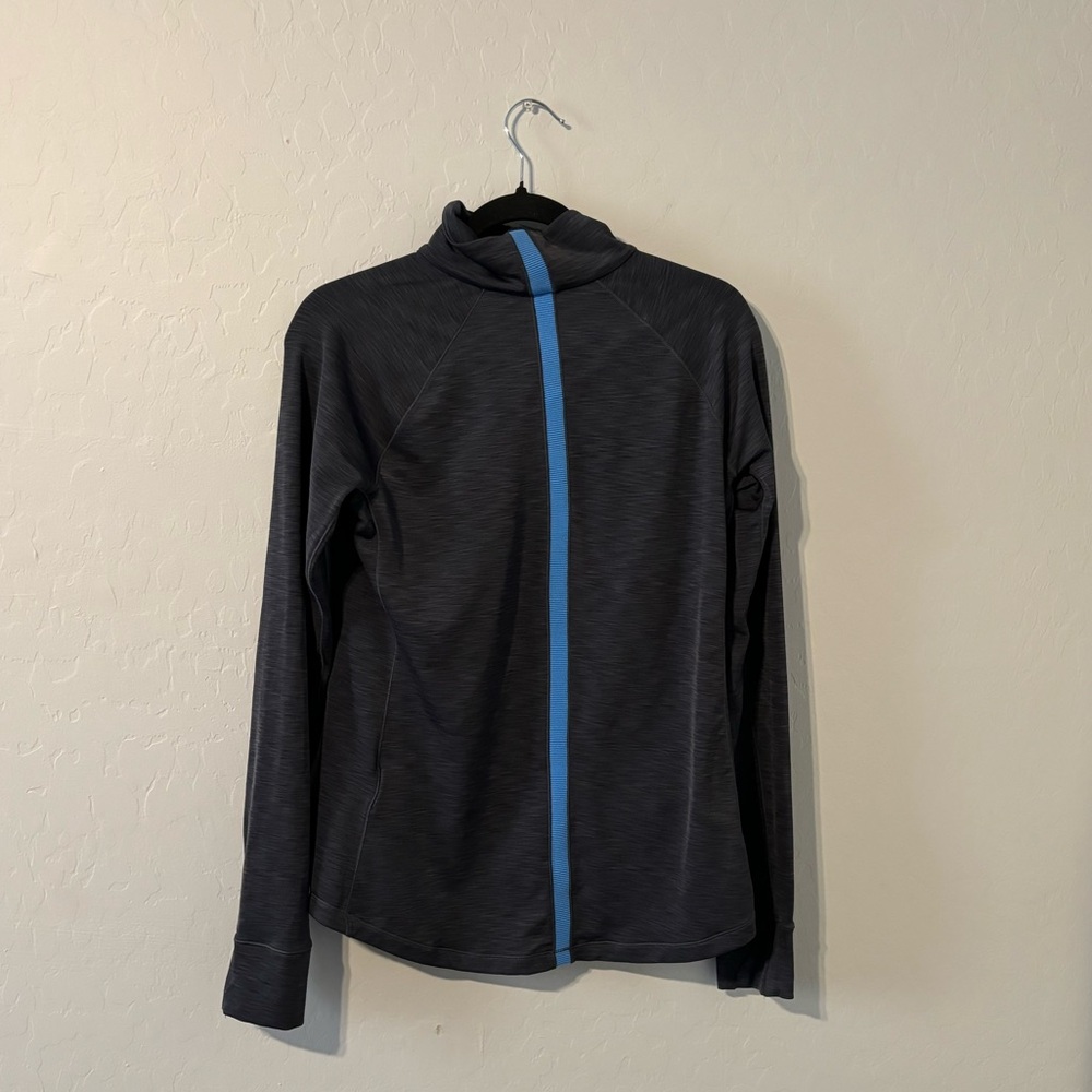 Under Armor fitted jacket, dark grey with blue zipper, thumb holes, size L